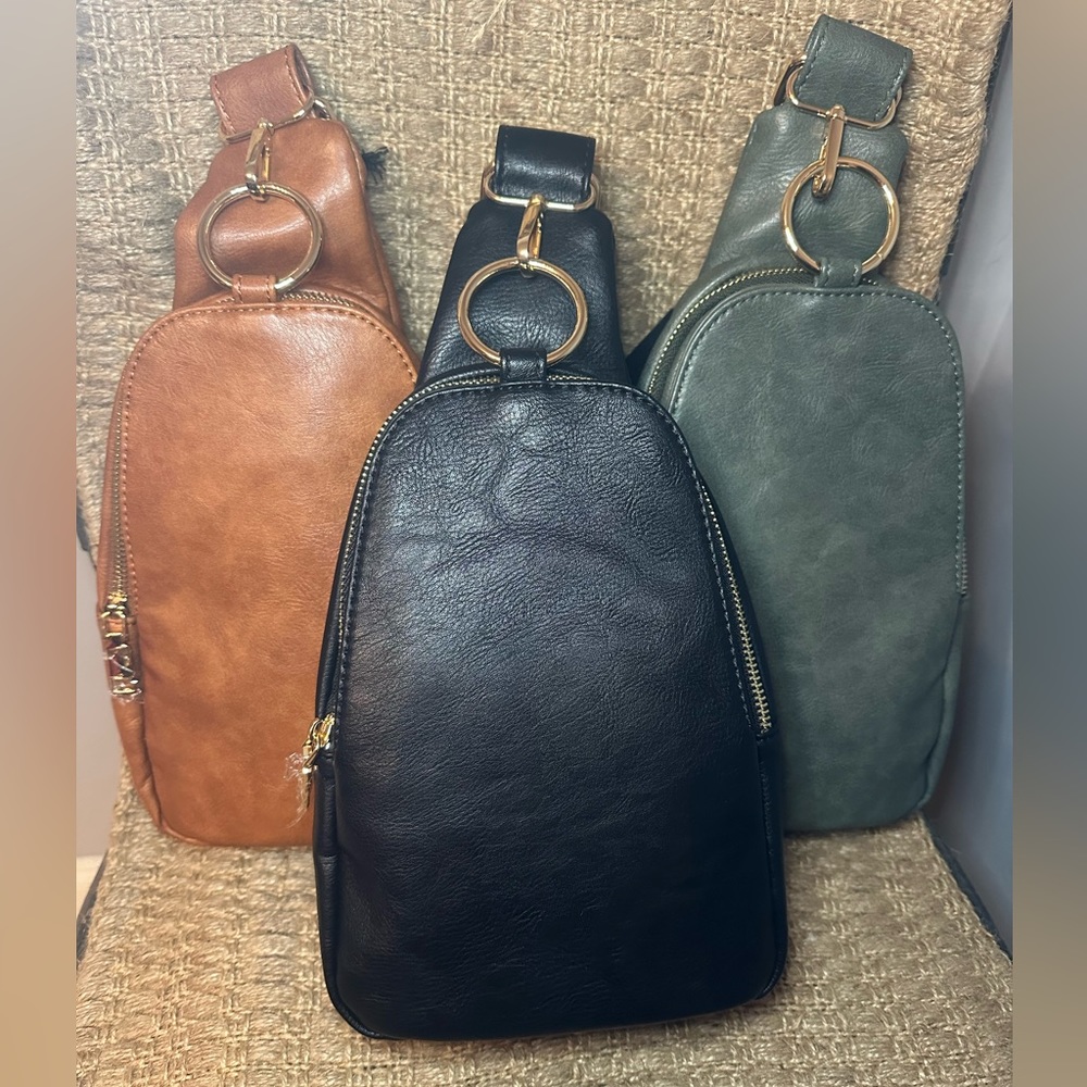 TAN sling backpack
